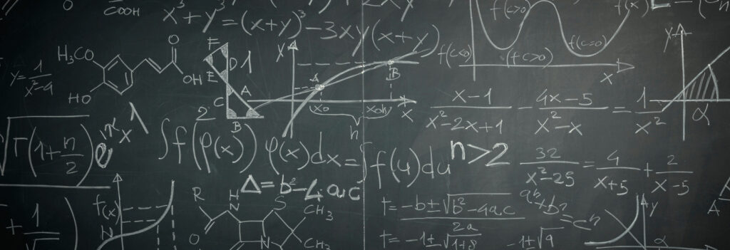 Calculations written on a chalk board for deeper analysis during a cost benefit analysis